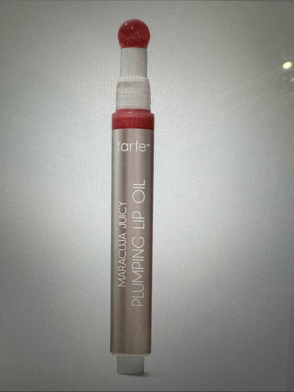 maracuja juicy plumping lip oil shimmering calla lily